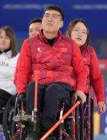 冬残奥会——轮椅冰壶混合团体循环赛：中国队不敌加拿大队 比分4比9告负