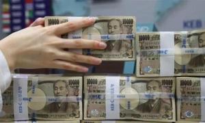 日元疯狂贬值，日本央行终于出手：削减债券购买量