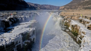 World's largest yellow waterfall frozen in time