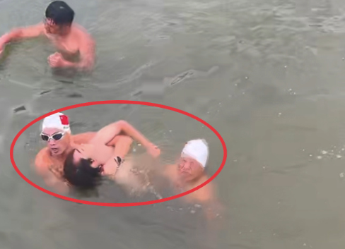 少年沉入赣江水底，冬泳队员潜水十几秒摸到人