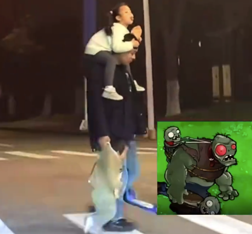 父亲背着千金拖着犬子过斑马线 网友:现实版“千金”与“犬子”