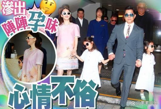 方媛穿宽松连衣裙陪郭富城看赛马 孕味十足幸福满满
