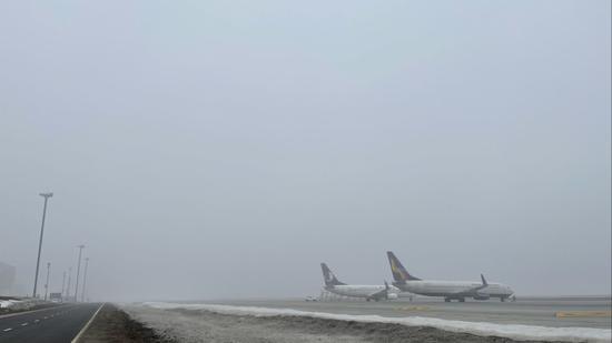 乌鲁木齐地窝堡国际机场遭遇冻雾 航班成功盲降