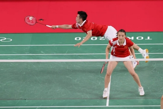  7月30日，郑思维/黄雅琼在比赛中。