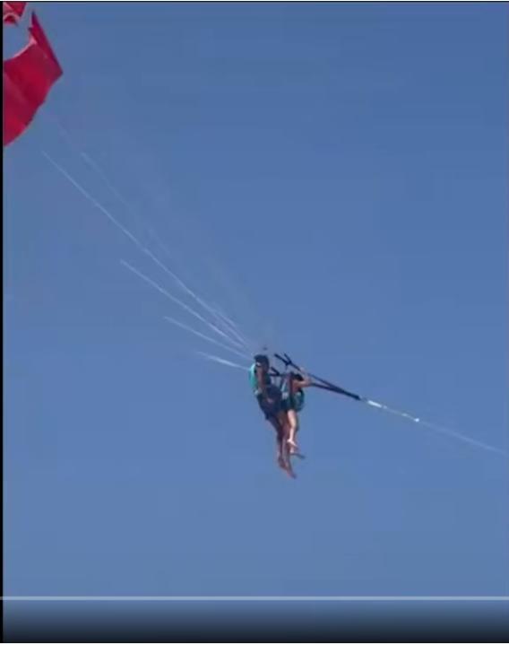 滑翔傘操作員空中緊貼女游客被捕 猥褻事件曝光