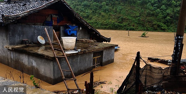 2022年5月27日,雲南文山,丘北縣突發暴雨災害,溫瀏鄉被淹沒的房屋.