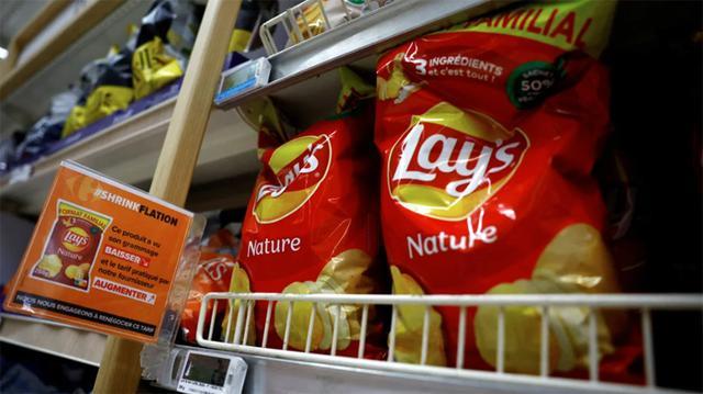 a shrinkflation sign at a carrefour supermarket near paris in