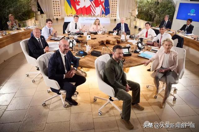 拜登参加g7峰会期间"走神"离开 梅洛尼将他拉回(2)