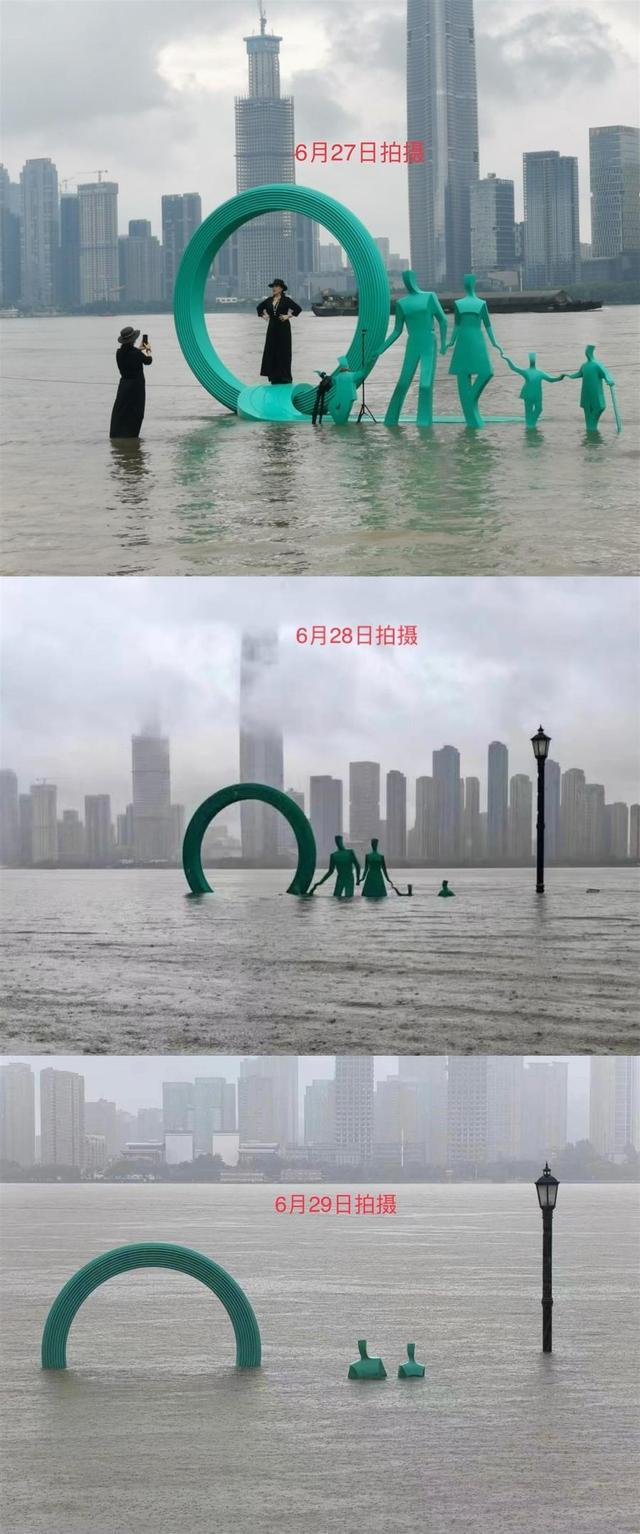 汉口江滩一家五口雕塑已被淹没大半