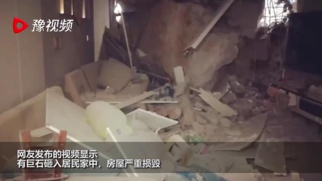 开发商爆破致巨石砸坏隔壁小区 居民楼严重损毁