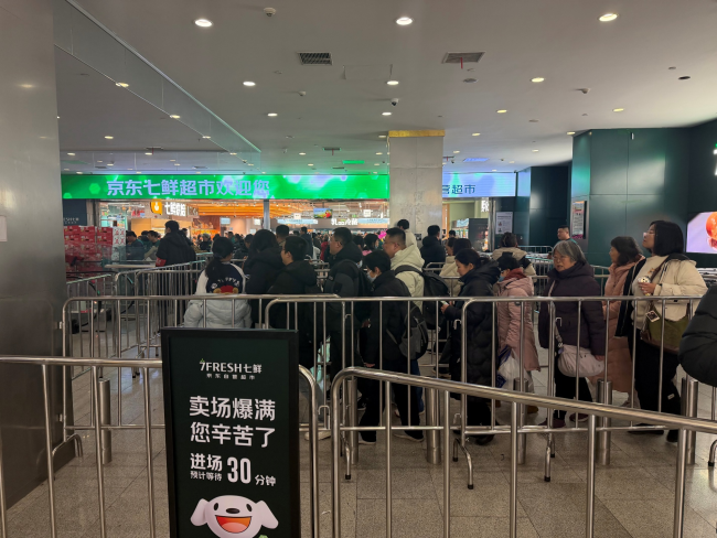 首日超3.5万人涌入,京东七鲜打造春运级开业现象