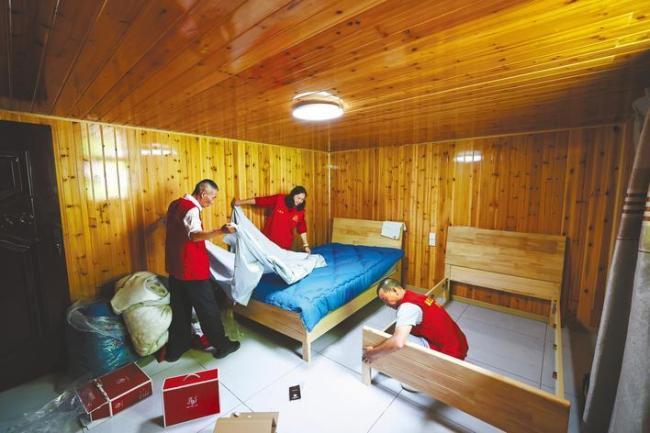 “梦想小屋”点亮大山微光 64个家庭的孩子住上舒心房