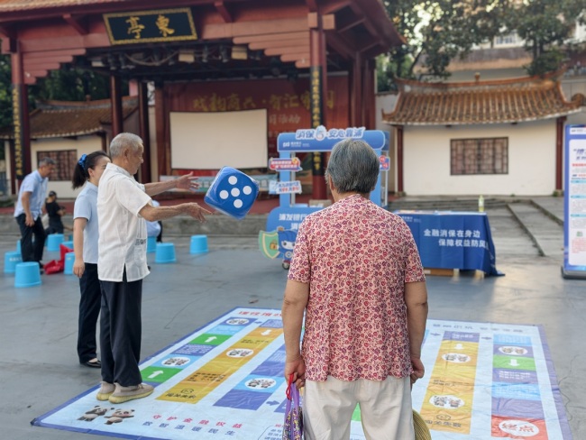 观影护航“钱袋子”!浦发银行武汉分行积极承办“与影随行”公益金融教育宣传活动