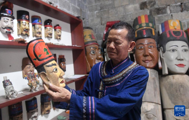 毛南族傩面：精雕细刻的民族非遗