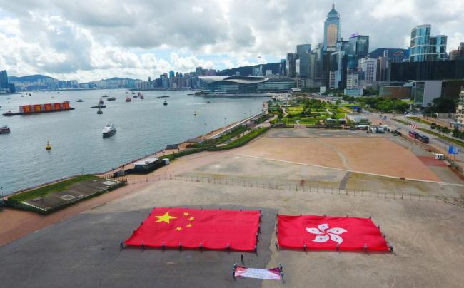 新华时评：香港民主发展道路必将越走越宽广