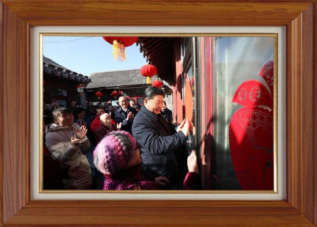 相框里的故事——聆听新年贺词，品读习近平主席书架照片的意涵