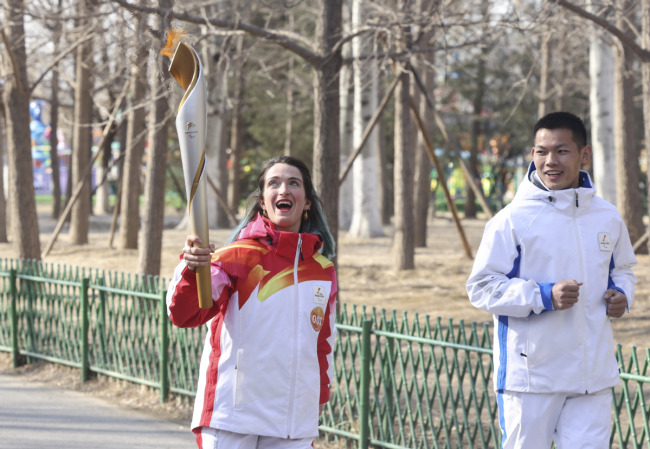 北京冬残奥会火炬闭环内传递在奥森公园进行