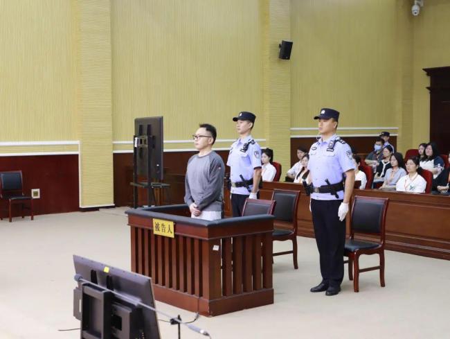 光大信托閆桂軍違規(guī)放貸63.9億受審 三宗罪指控庭審