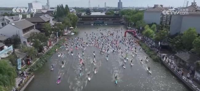 “亲水经济”爆火玩出夏日新热度 水上运动带动多地经济升温