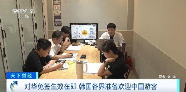 韩国小吃摊挂起中文菜单 迎接中国游客热潮