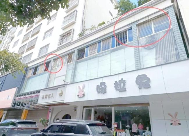 商场外墙瓷砖掉落2路人险被砸 安全隐患引关注