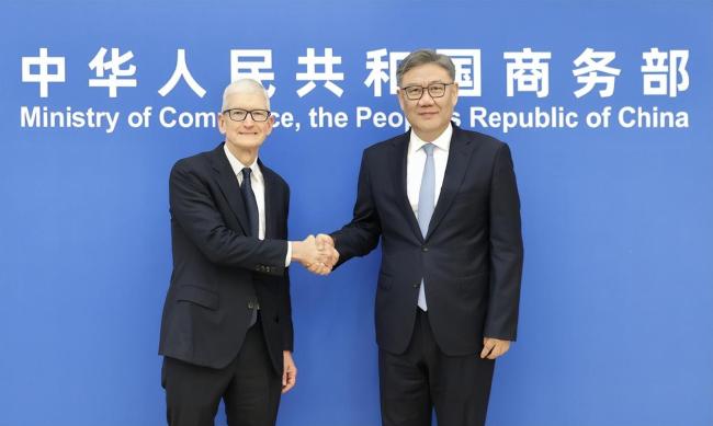 王文涛会见苹果CEO库克