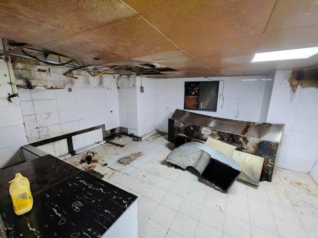 深圳一地下车库粉尘爆表 物业违规搭建厨房存隐患