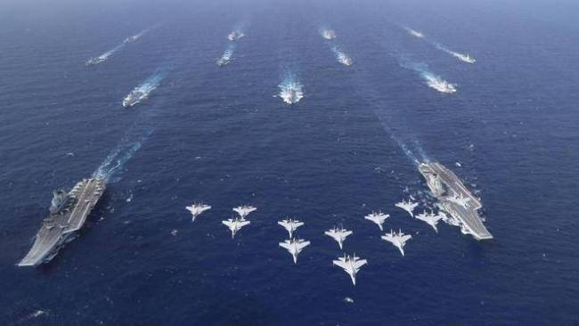 高市想体面认输，解放军报警告清算日本 双航母出海示警