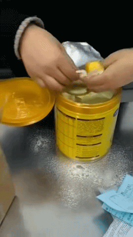 女子用奶粉罐藏金条寄出警方及时拦截