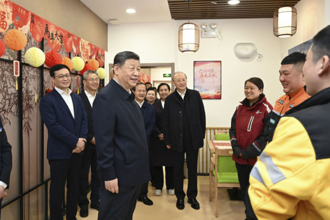 新華圖訊丨習(xí)近平春節(jié)前夕在北京看望慰問基層干部群眾