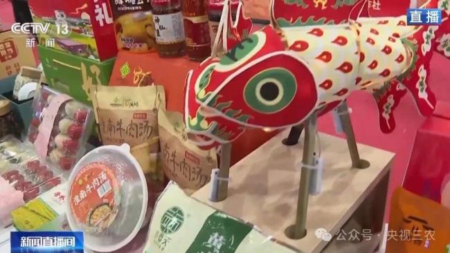 来逛总台“机器东谈主年货大集” 科技添趣迎新春