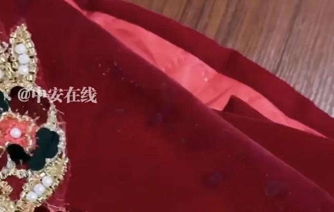 女子网购敬酒服穿脏后退货退款 焊接吊牌引发热议