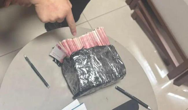 男子取9万多现金被警方拦下 真相令人震惊