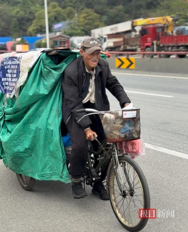 90岁老人孤身骑行30年重返江西