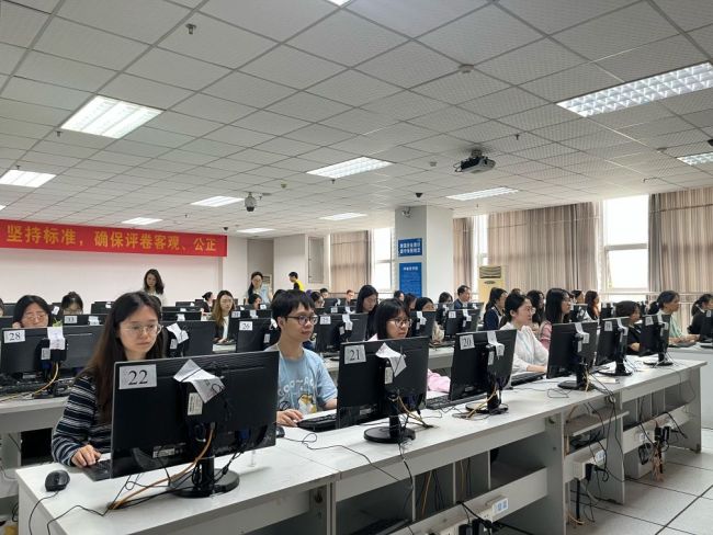 走进高考评卷点：你的试卷怎么打分 揭秘公平公正的硬核举措