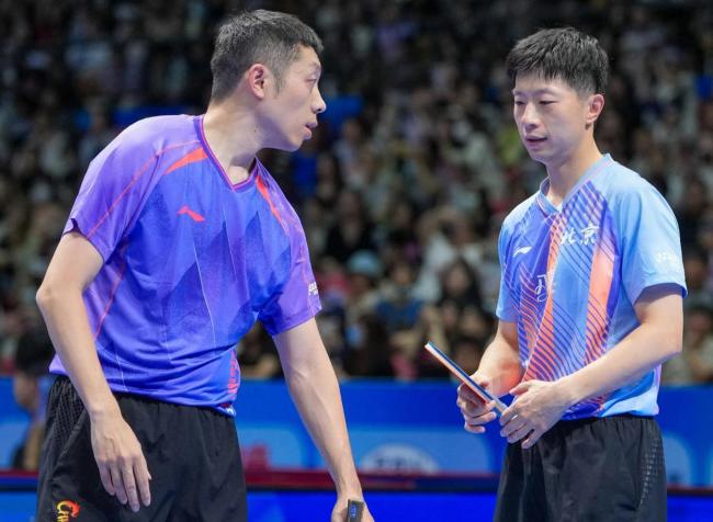 马龙许昕3比2险胜周冠宏于海洋