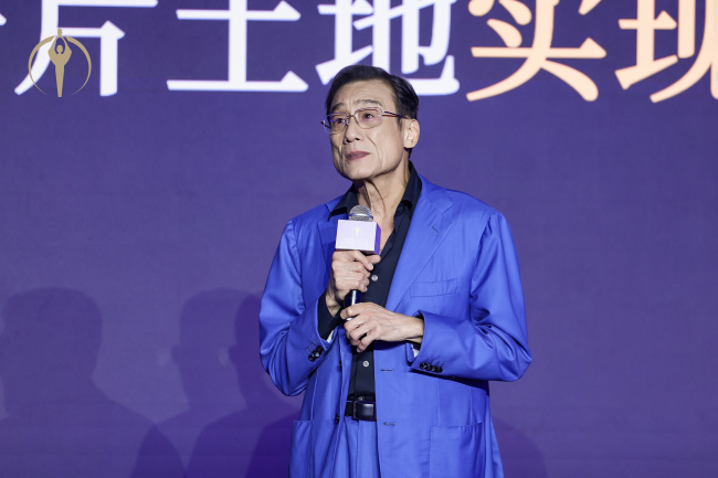 梁家辉人民日报撰文
