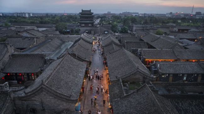 Pingyao Ancient City: A Beacon of War on the Gate Tower, a City's Glory on Screen