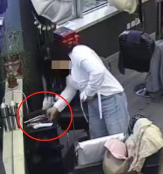 女子偷美發(fā)店千元剪刀被拘 監(jiān)控記錄全過程